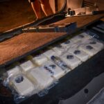 54 kilogramy amfetaminy znalezione w skrytce w bagażniku samochodowym. Fot. Centralne Biuro Śledcze Policji