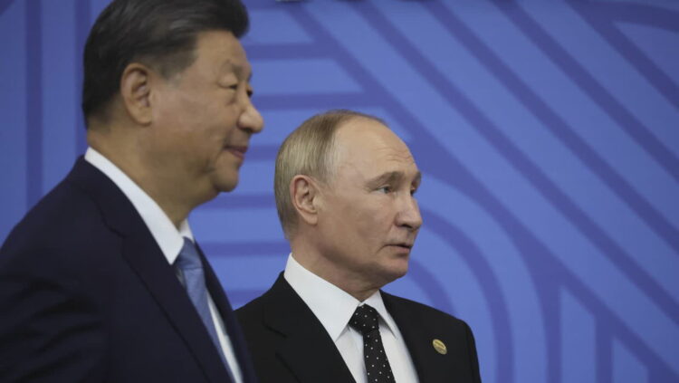 Xi Jinping i Władimir Putin (PAP/EPA/MAXIM SHIPENKOV)