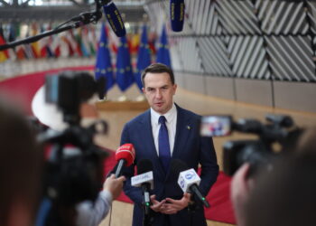 Adam Szłapka, minister ds. europejskich (PAP/EPA/OLIVIER HOSLET)