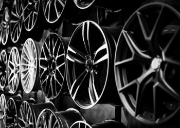 Car alloy wheels in a store, selective focus.