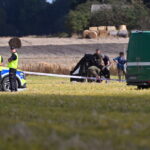 Służby w miejscu upadku rosyjskiego drona w miejscowości Wohyń (PAP/Wojtek Jargiło)