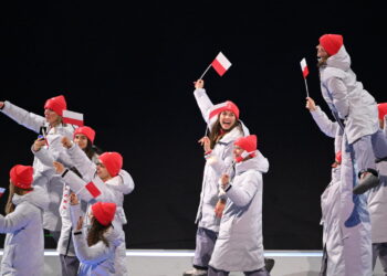 Olimpijska reprezentacja Polski podczas ceremonii otwarcia zimowych igrzysk we Włoszech. PAP/Paweł Skraba