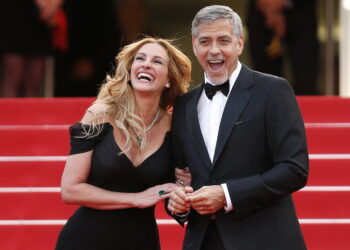 Fot. Julia Roberts i George Clooney przybywają na pokaz filmu „Money Monster” podczas 69. dorocznego Festiwalu Filmowego w Cannes. Fot. PAP/EPA/IAN LANGSDON
