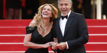 Fot. Julia Roberts i George Clooney przybywają na pokaz filmu „Money Monster” podczas 69. dorocznego Festiwalu Filmowego w Cannes. Fot. PAP/EPA/IAN LANGSDON