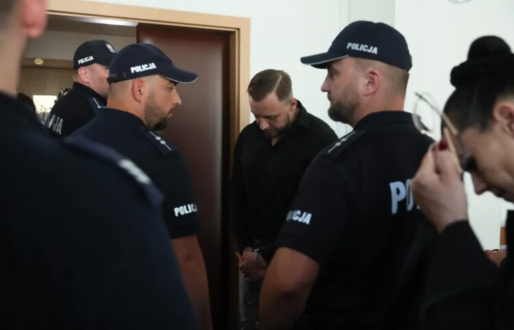 Oskarżony Łukasz Żak (C) na sali rozpraw Sądu Rejonowego dla Warszawy-Śródmieścia, fot. PAP/Leszek Szymański
