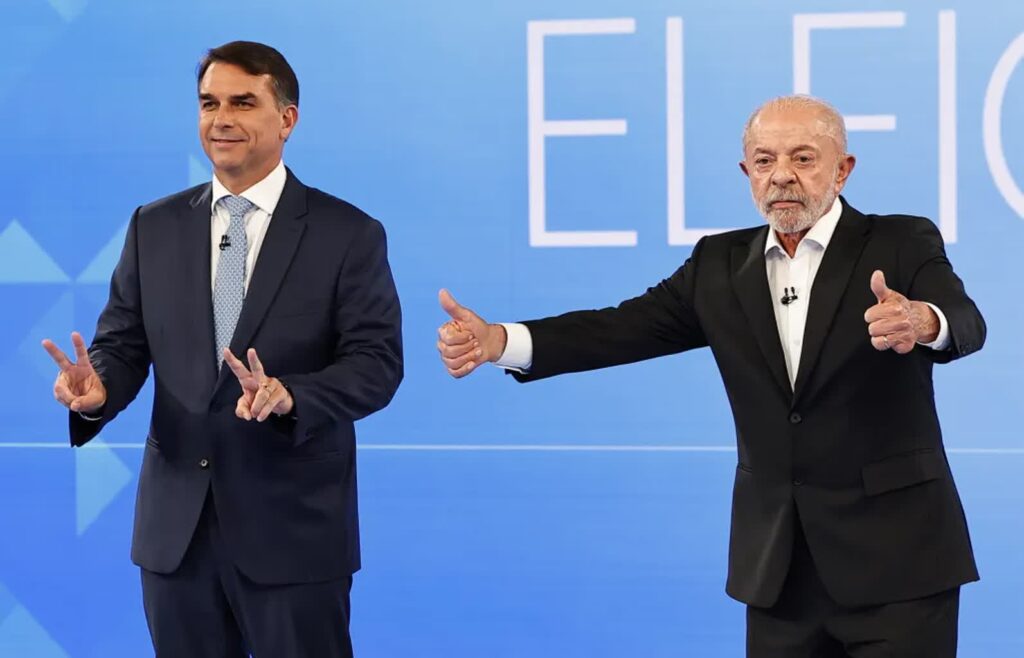 Flavio Bolsonaro i Luiz Inacio Lula da Silva Fot. PAP/EPA/Andre Coelho